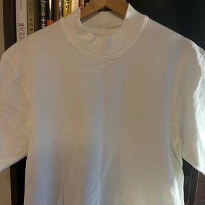 100% Cotton. White shirts reigning champ. New